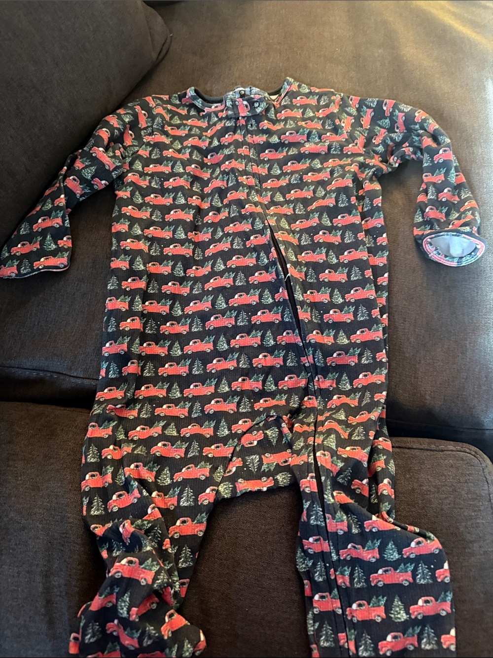 Kids Black Pajama One-Piece with Red Truck Print
